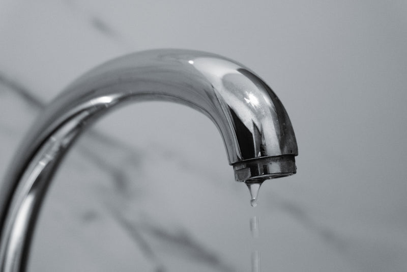 Chrome faucet with a thin weak stream of water